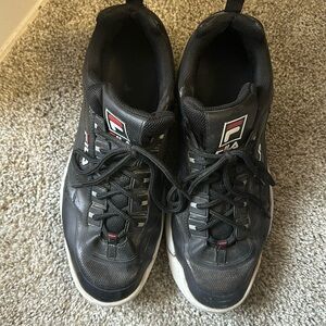These are Fila shoes. Size 12 There black with red and white logo